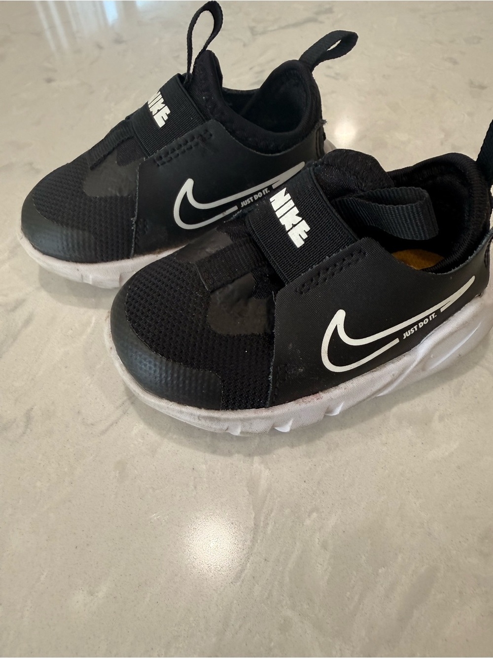 Nike Kids Black and White Slip-On Sneakers